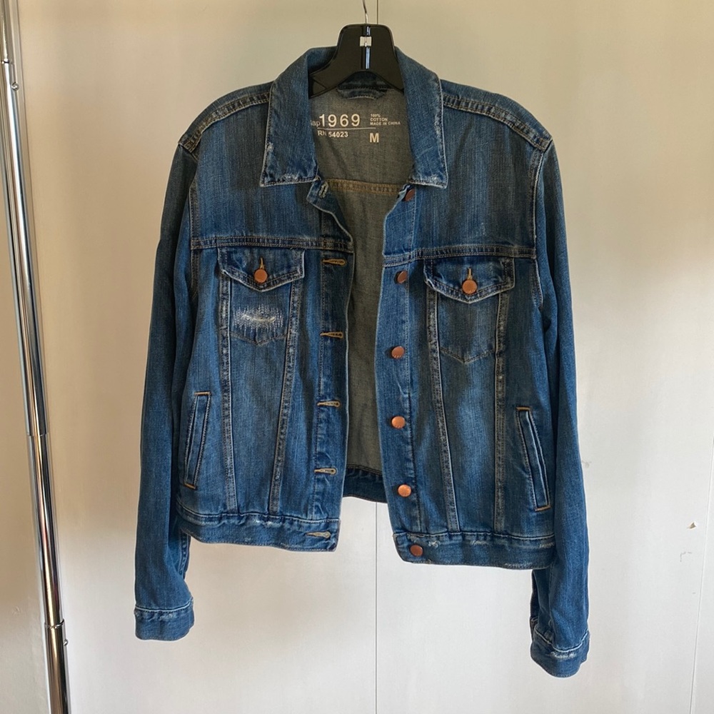Distressed denim jacket